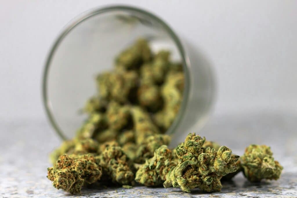 - Nature Med Dispensaries - Nature Med Dispensaries Assorted green cannabis nuggets and flowers showing the different textures of Sativa and Indica plants.